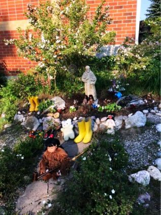 Memorial at St. James Catholic before it was removed on Sunday. It is going back 